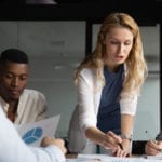 Researchers at a table stock photo